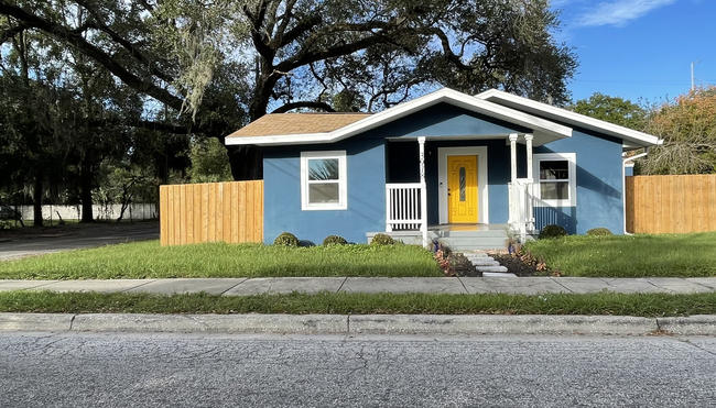 House with tree in background