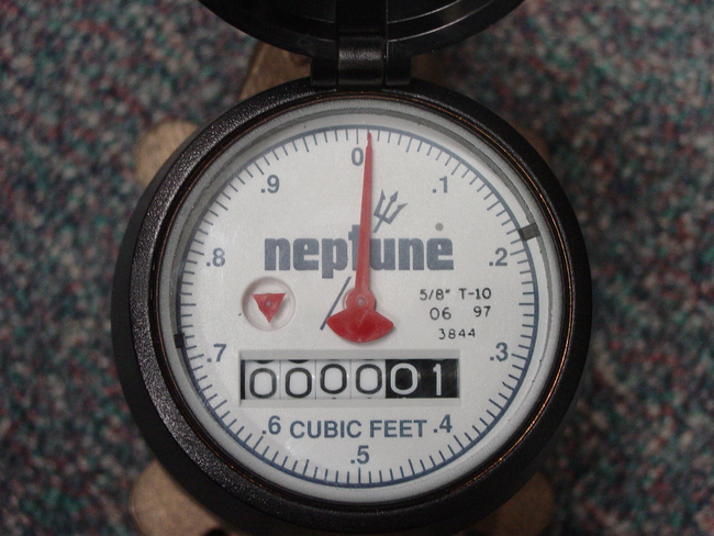 Close-up photo of a water meter.