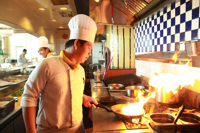 Chefs in restaurant kitchen