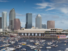 Photo of Tampa Convention Center with Tampa skyline in the background and boats filling the marina during the 2011 Red Bull Flugtag.